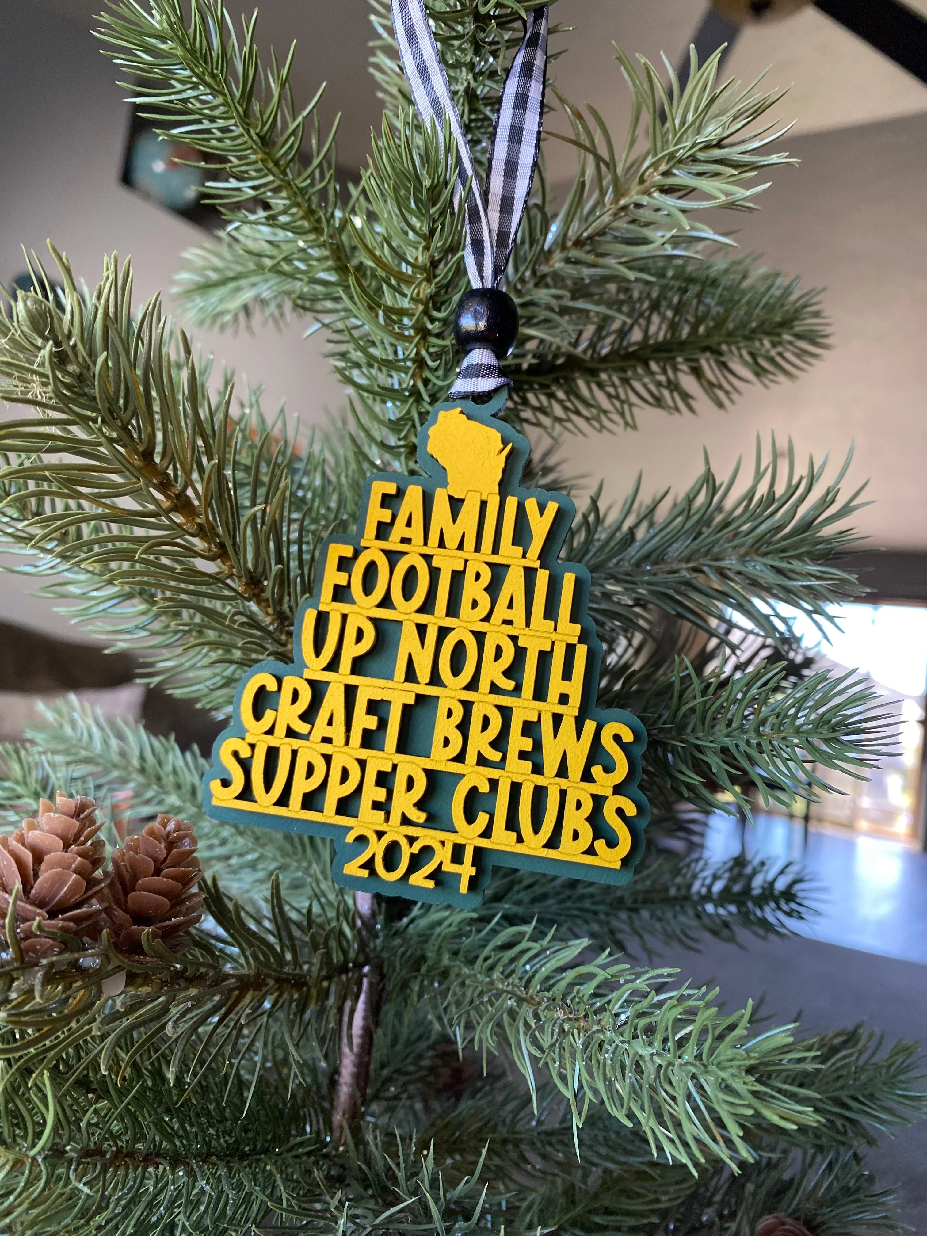 Handmade Wisconsin favorite things word ornament - green